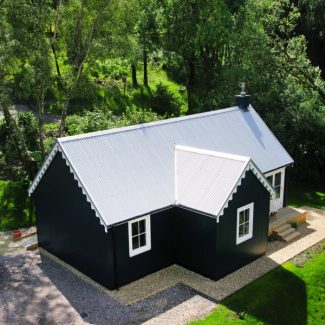 Aerial shot of The Blue Cottage by Loch Awe in Argyll, Scotland